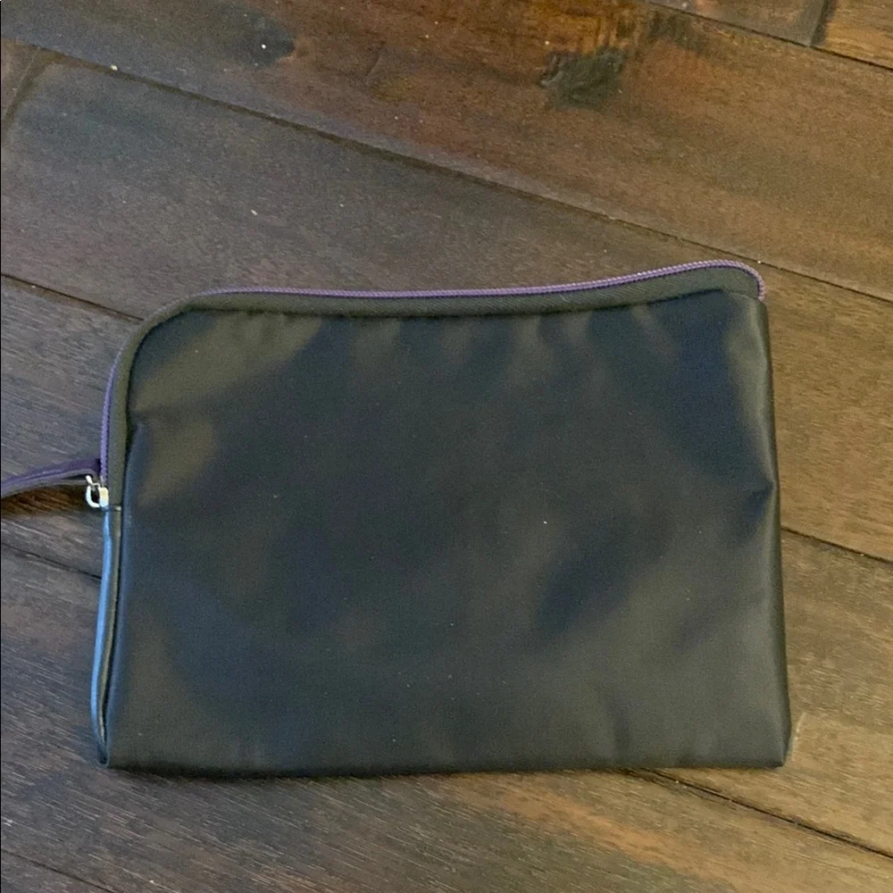 TUMI for Delta Black and Purple Travel Pouch